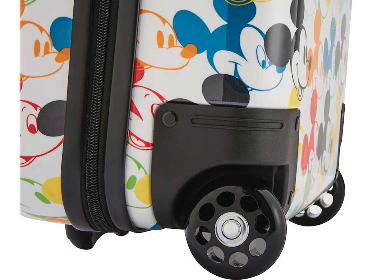 up close view of mickey mouse suitcase and wheel