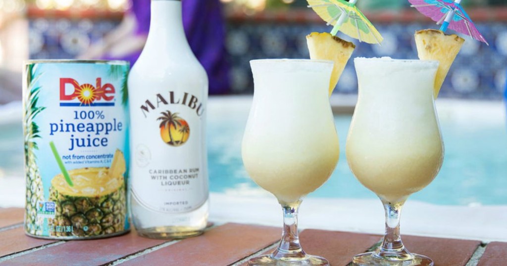 drinks sitting by a pool