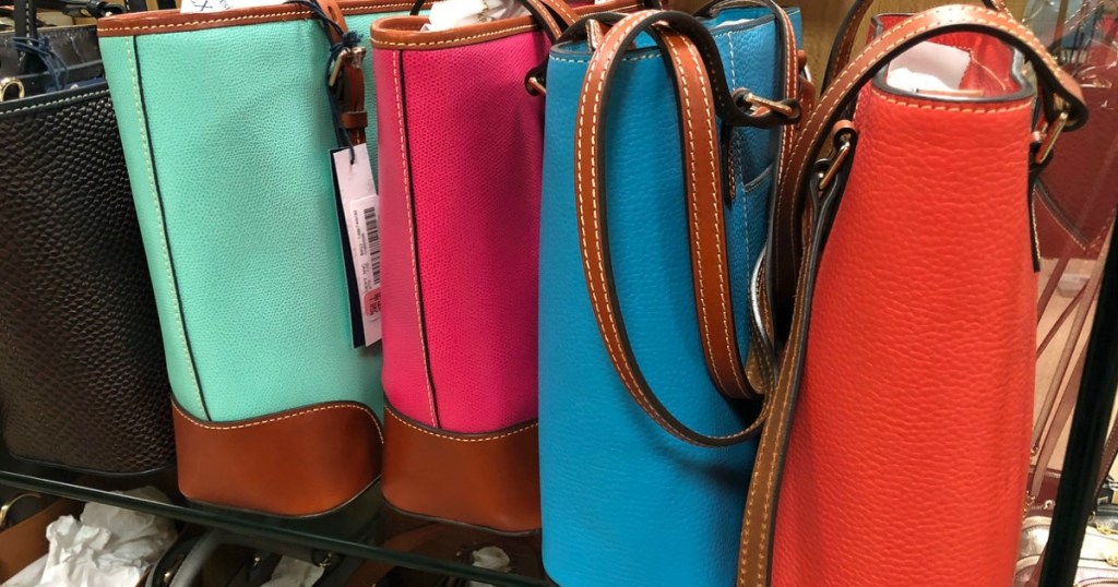 tote bags in different colors in store display