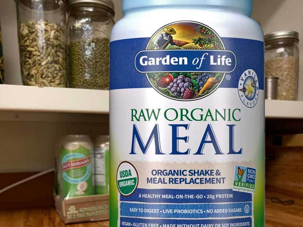 garden of life raw organic meal replacement on floor of pantry