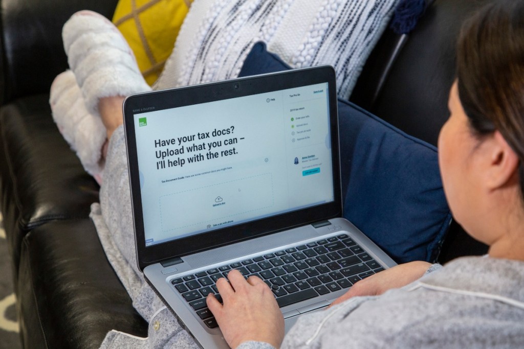 woman using H&R Block on laptop