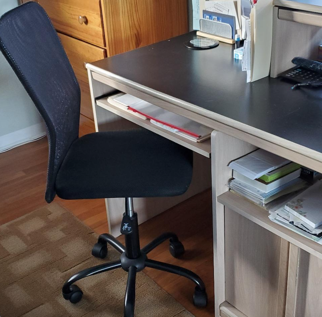 home office with small desk and chair 
