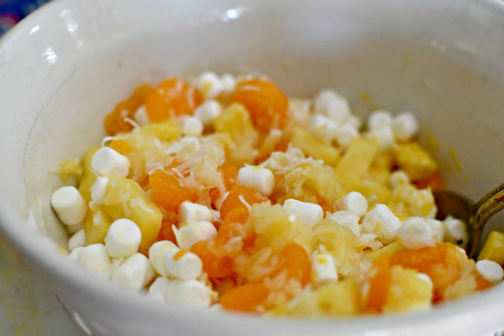 pineapple fluff salad ingredients in a large mixing bowl