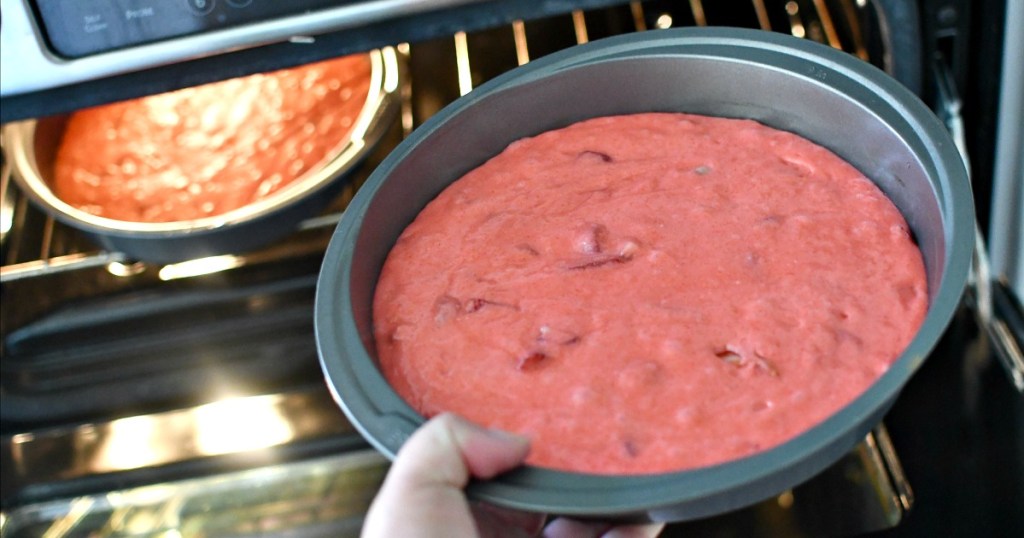 putting cake pans in the oven