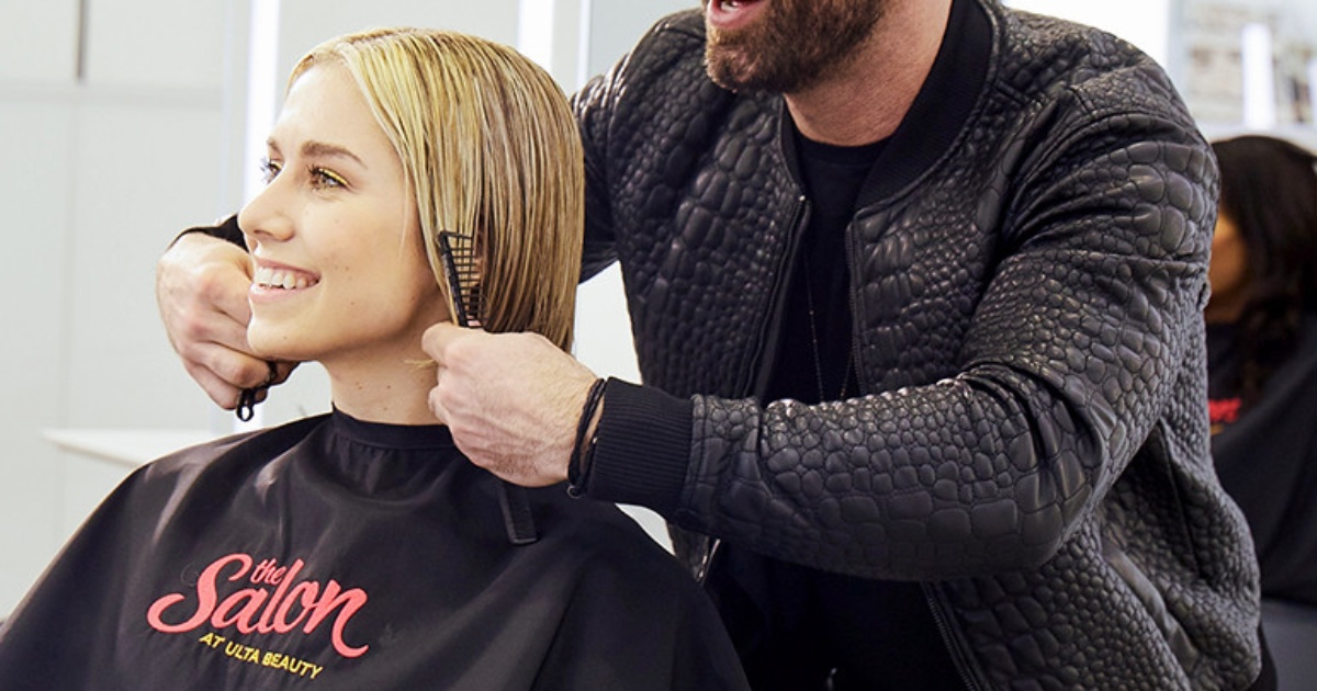 woman getting hair cut