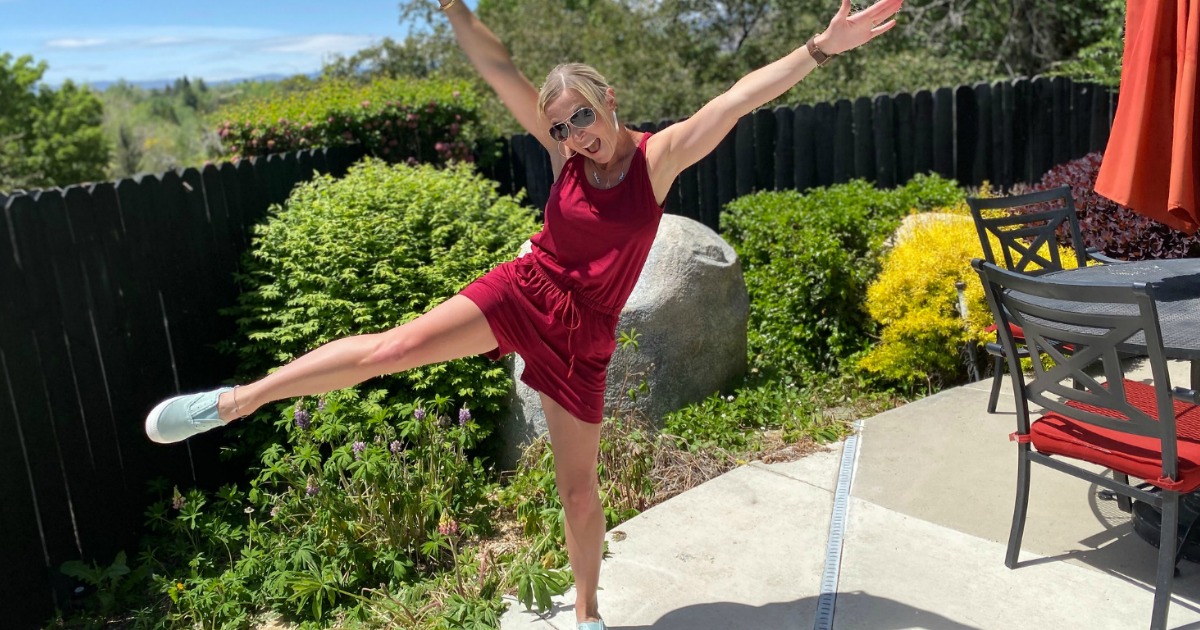 woman excited while wearing shorts jumpsuit 