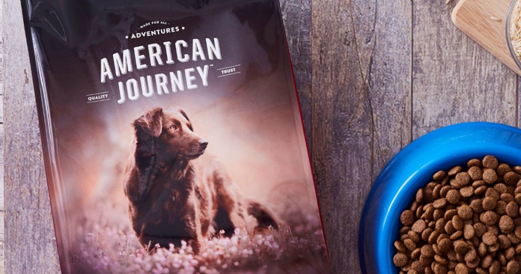 bag of dog food next to a bowl of dog food