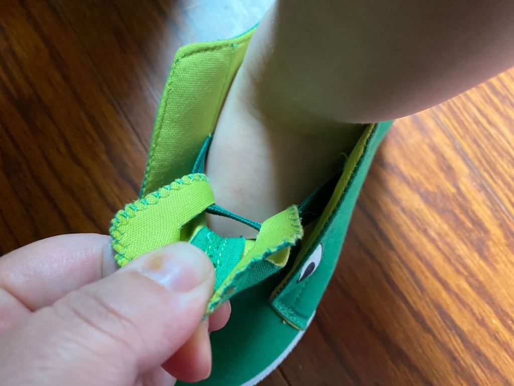 Baby alligator shoes on toddler