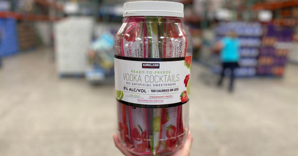 hand holding tub of vodka cocktail pops