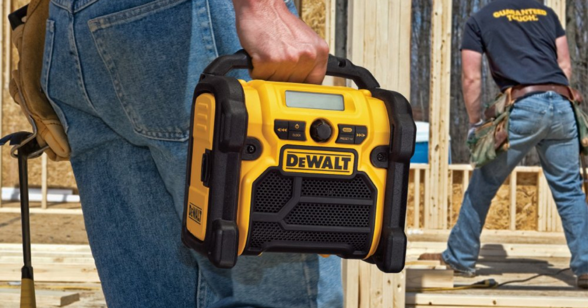 dewalt radio being carried by man