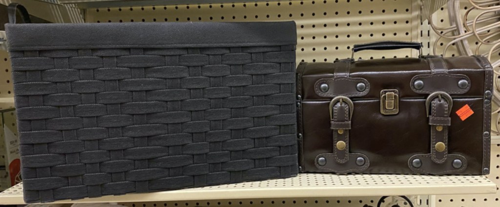 large black woven chest and small brown chest with buckles