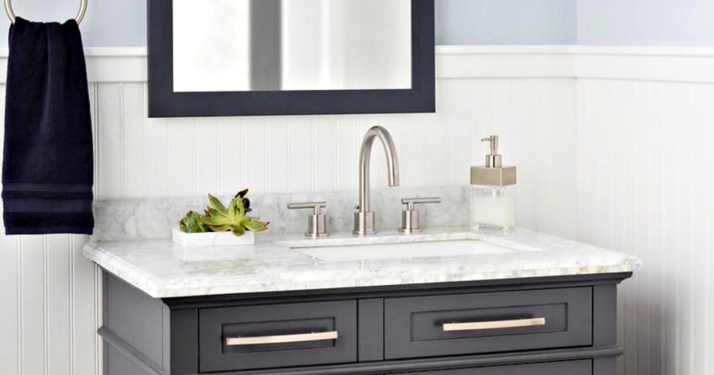 Dorset 2-Handle High-Arc Bathroom Faucet on vanity in bathroom