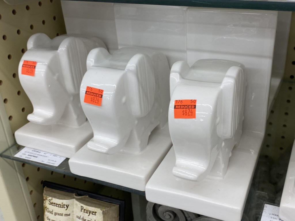 white elephant bookends on store shelf