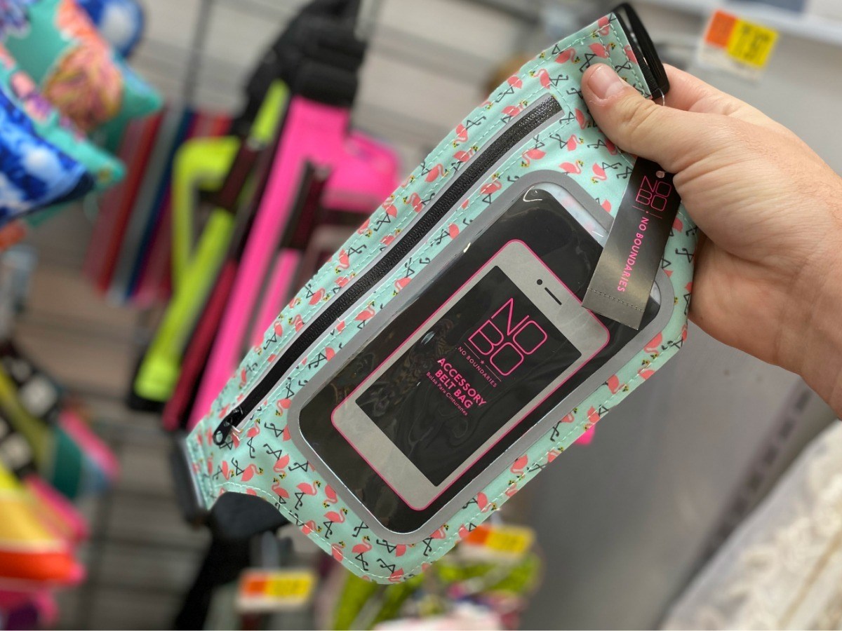 hand holding fanny pack with clear front pouch