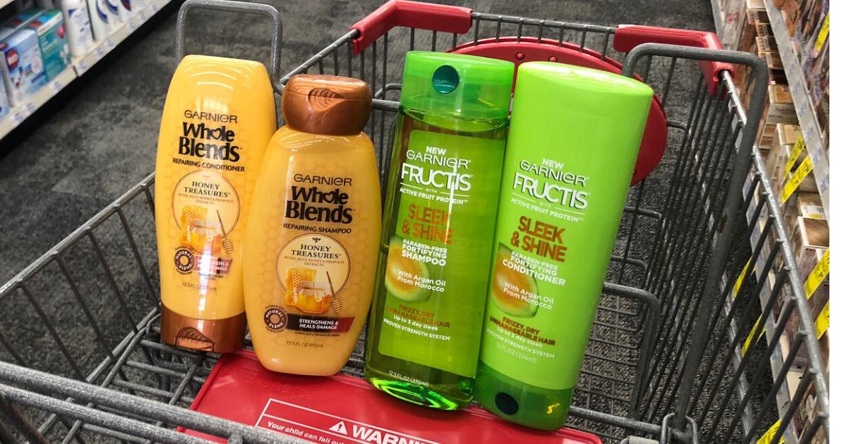 two bottles of garnier whole blends and two bottles of garnier frutis in cart at cvs