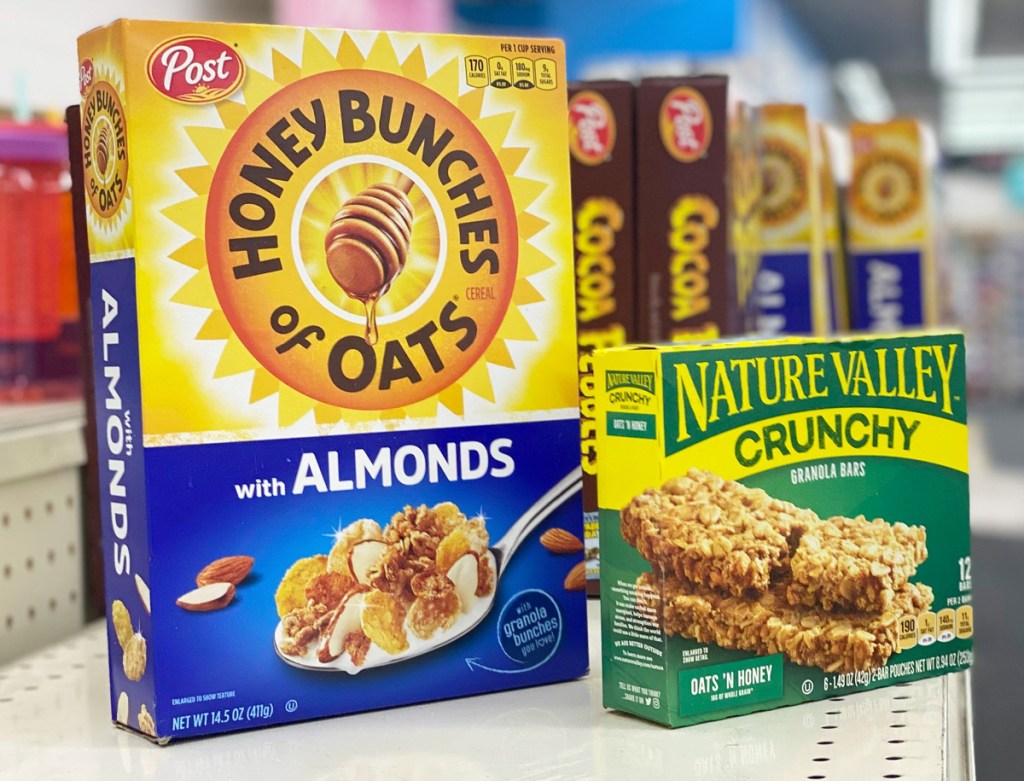 box of honey bunches of oats cereal and box of nature valley cereal bars sitting on store shelf