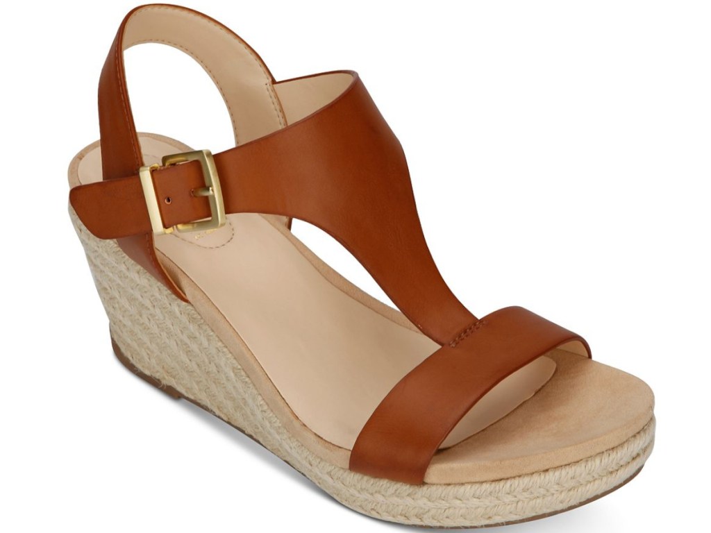 brown open-toed sandals with side buckle and wedge heel