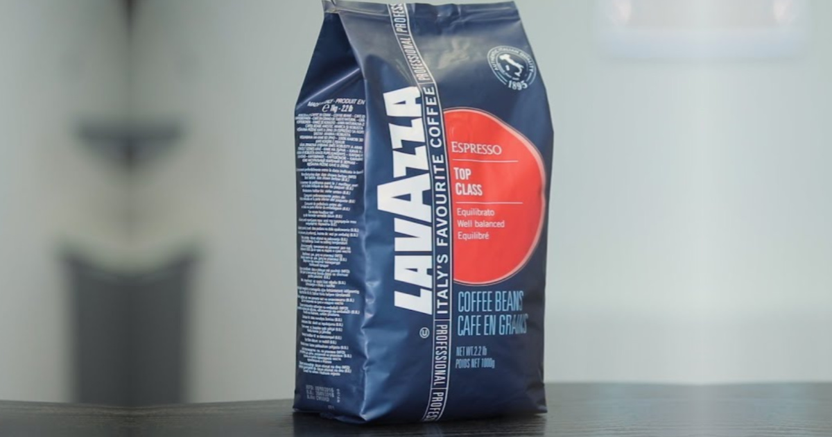 blue bag of coffee on dark table