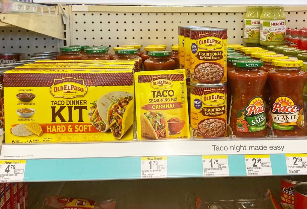 store shelf full of old el paso taco dinner supplies and pace salsa jars