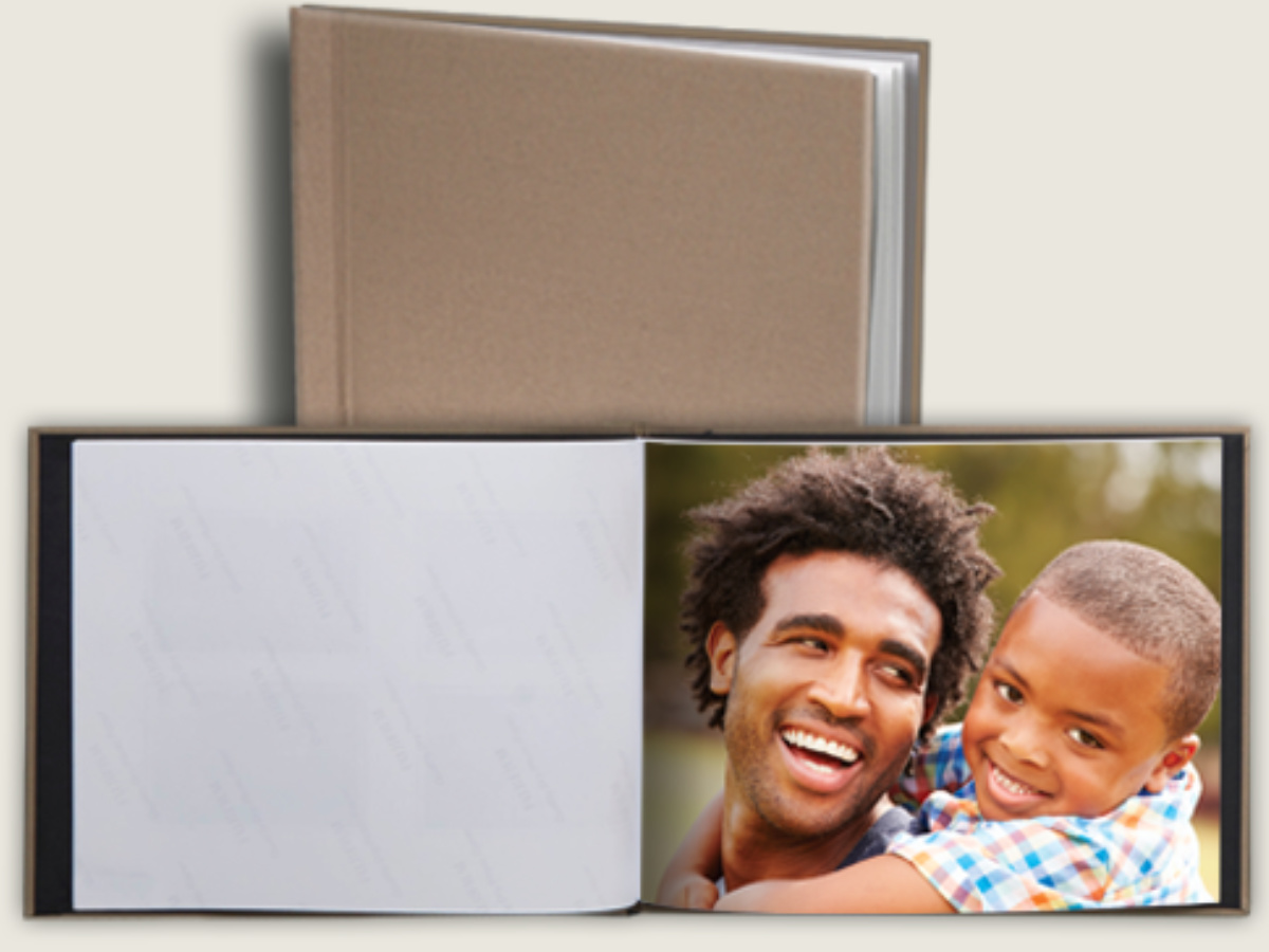 photo book with photo of boy and dad