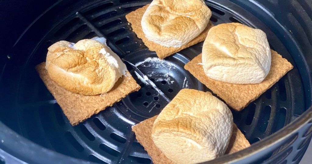 Roasted marshmallows on graham cracker halves in an air fryer