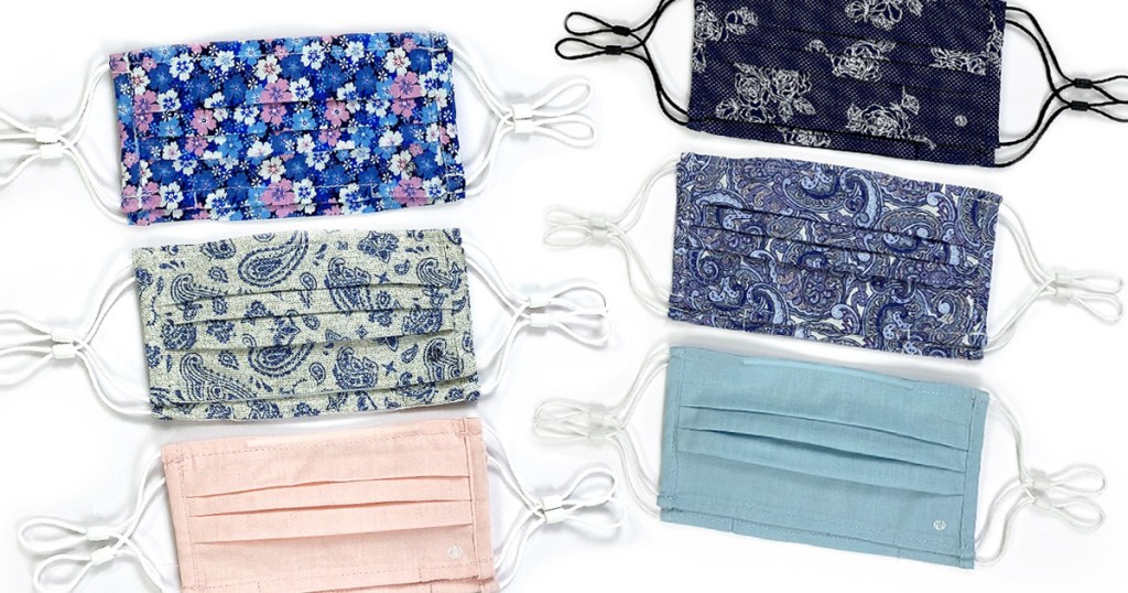 sets of reusable face masks with elastic ear loops in floral prints and solid pink and light blue colors