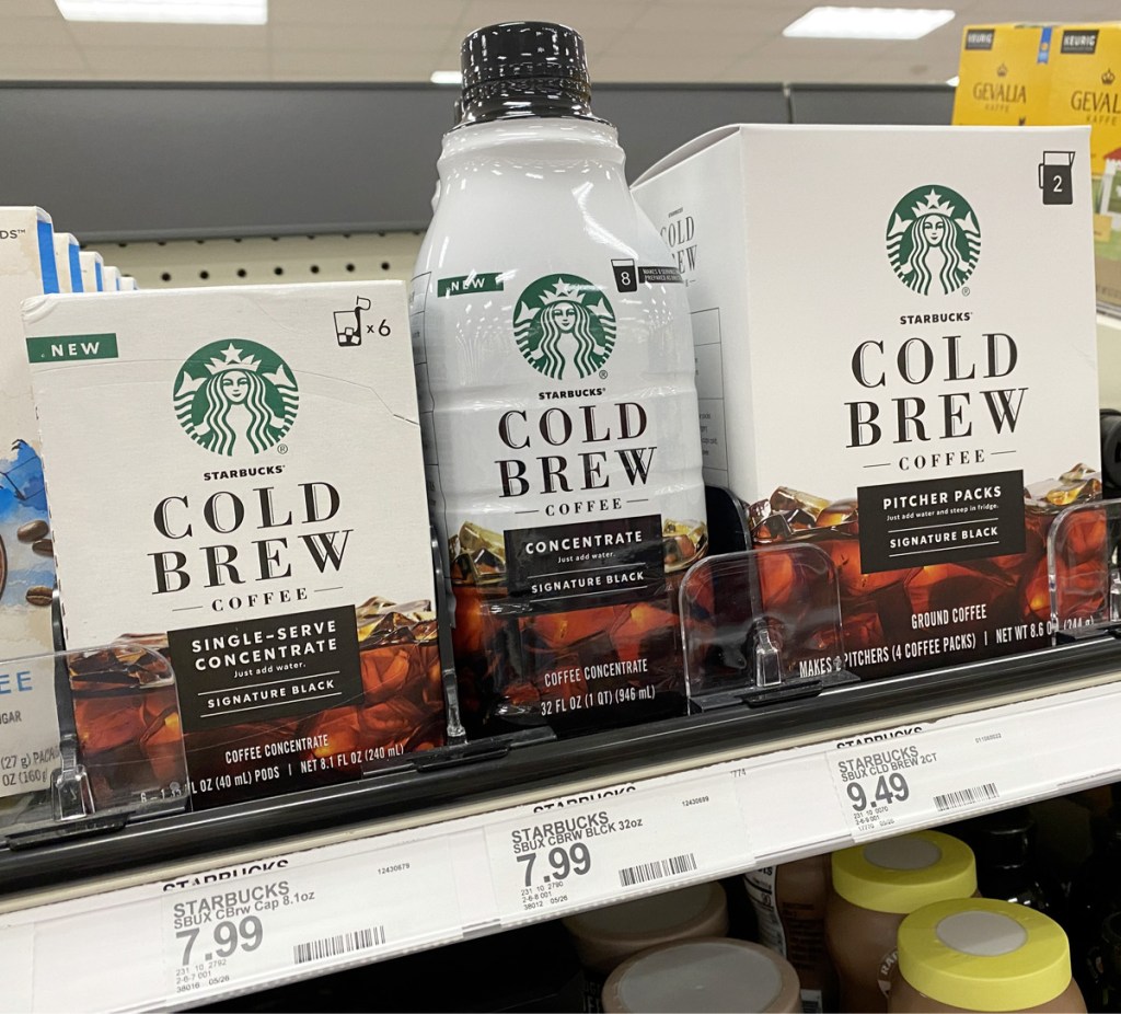 white and brown starbucks cold brew concentrate boxes and bottles on store shelf