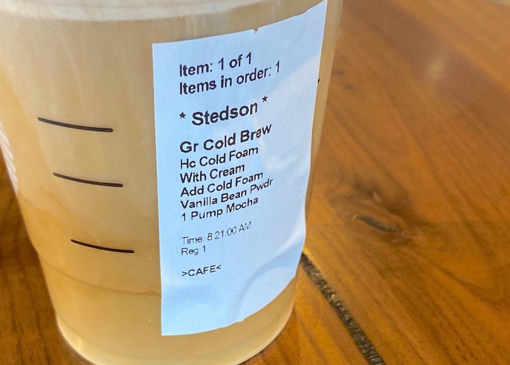 close up of starbucks order sticker on plastic cup