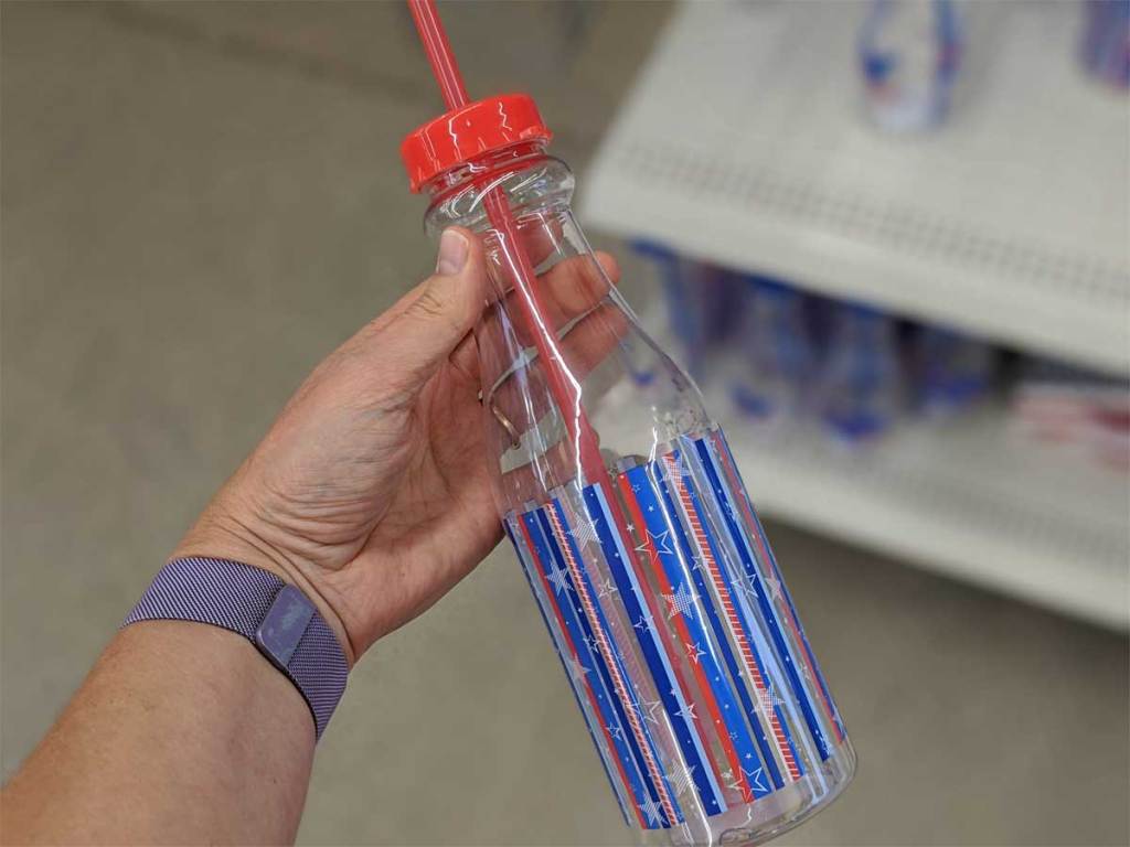 hand holding patriotic water bottle 