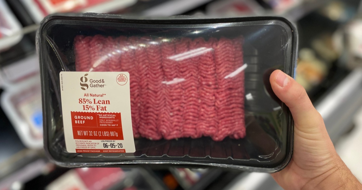hand holding good & gather lean ground beef