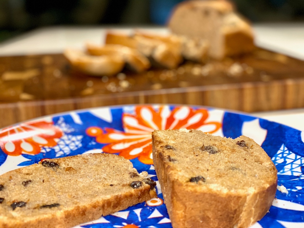 homemade cinnamon raisin bread slices on plate 