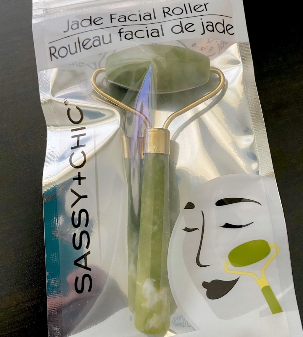 green jade roller in packaging 