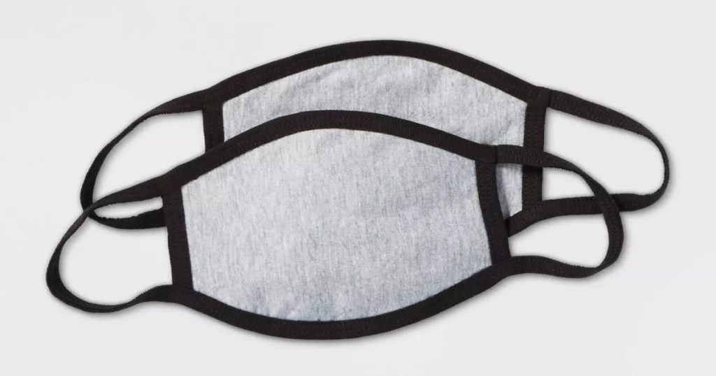 two kids sized fabric masks in grey and black