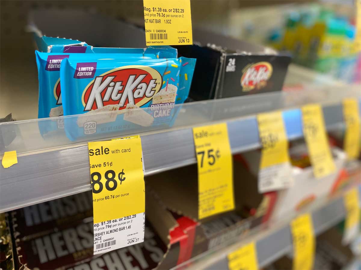 chocolate bars on a shelf in a store