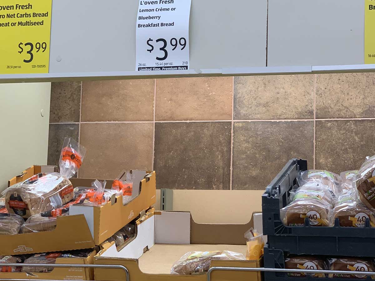 price display of bread on a shelf in a store