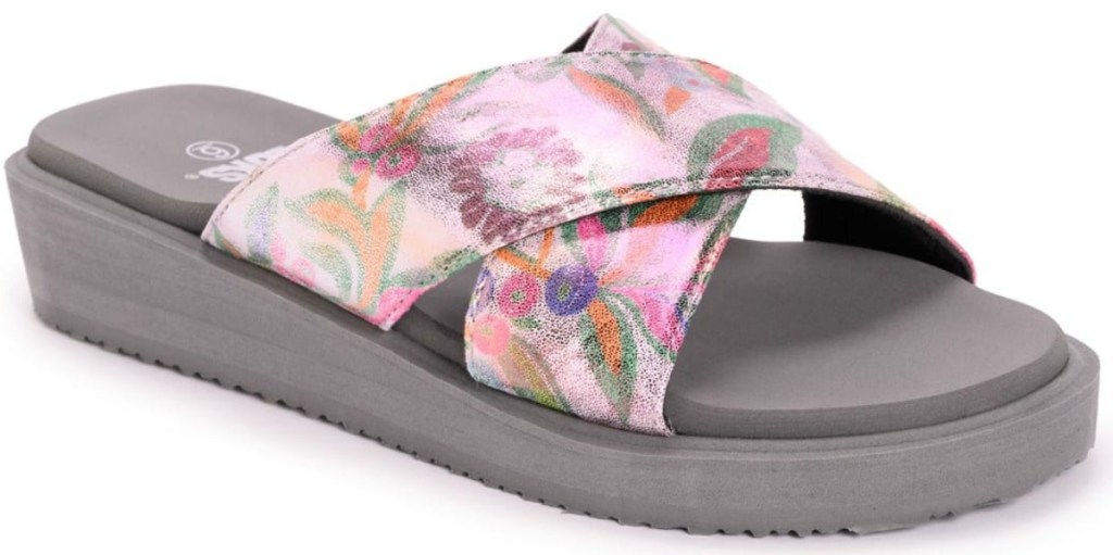 one pink sandal on white background