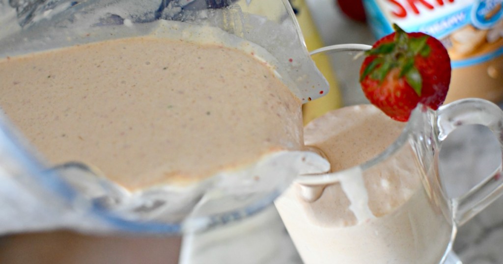 pouring a peanut butter and jelly milkshake