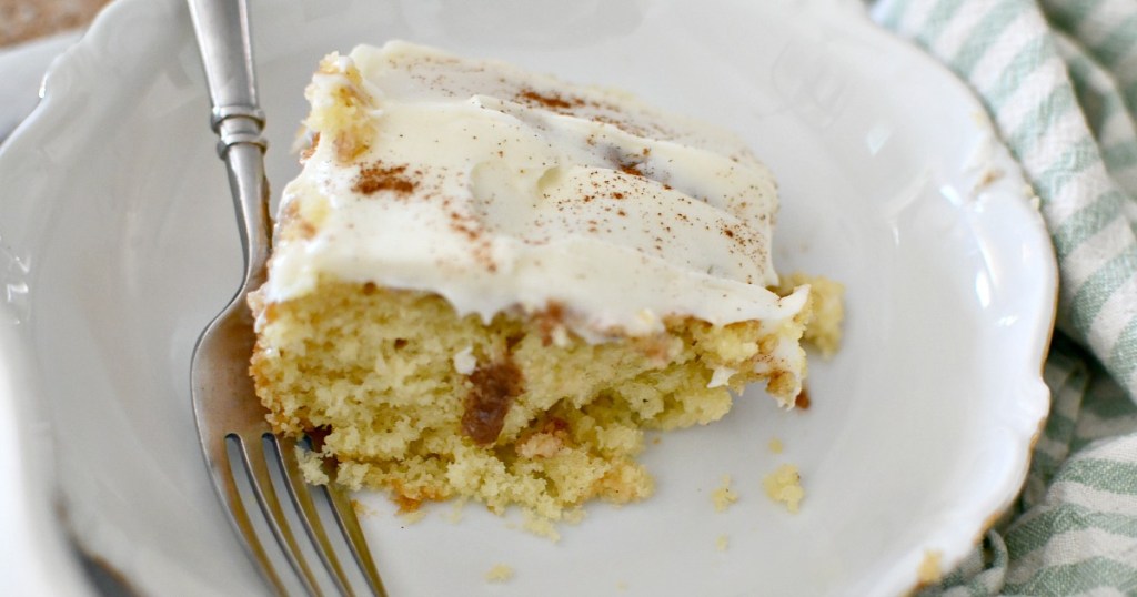 slice of cinnamon roll poke cake