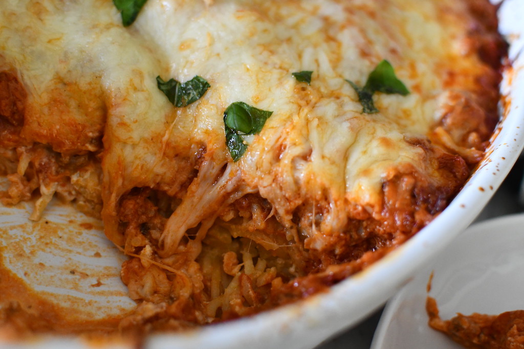 close up of cheesy spaghetti casserole 