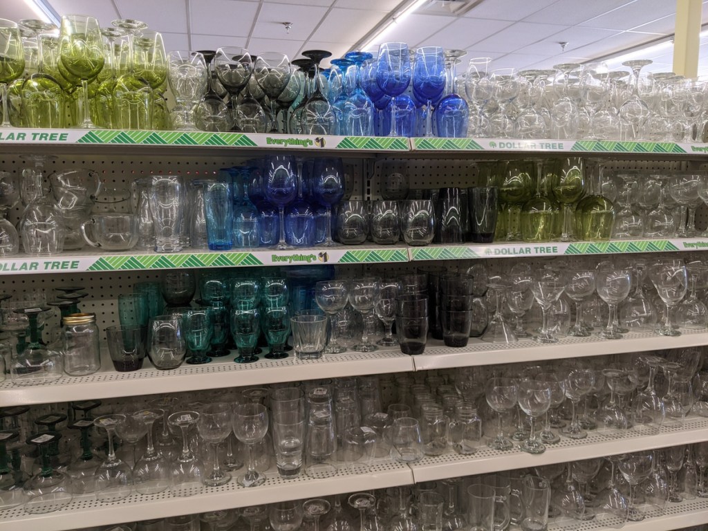 5 shelves full of drinking glasses in dollar store