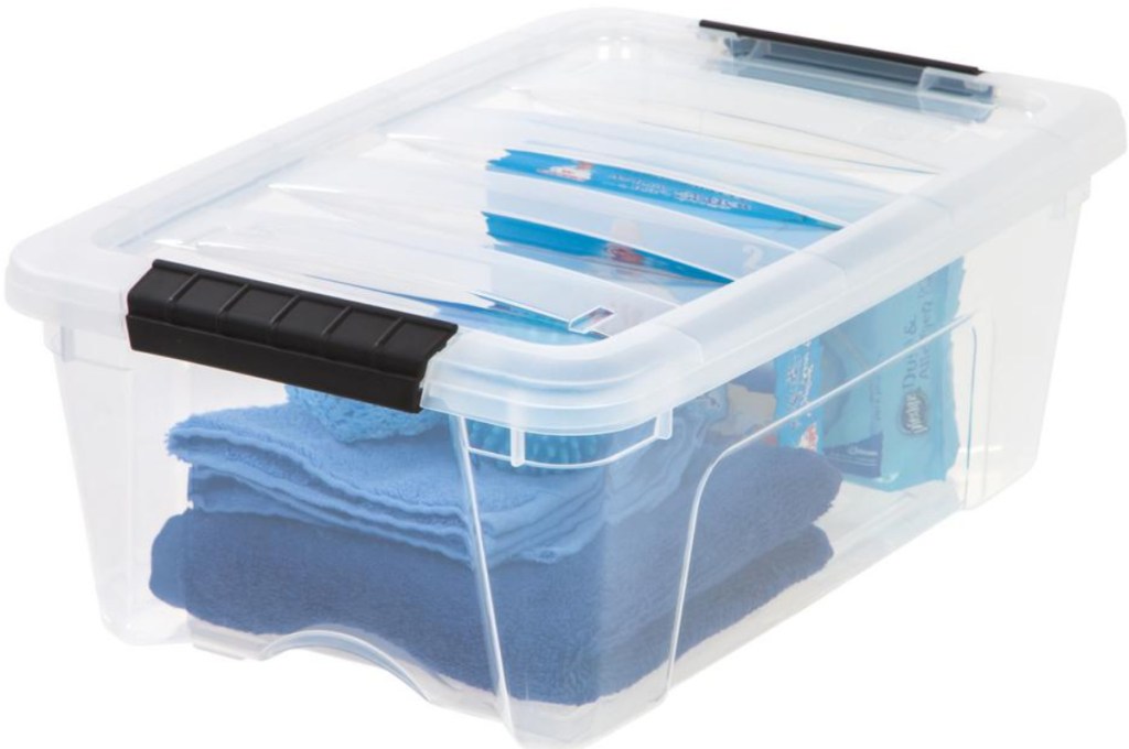 clear box and top with black handles and contents in bin