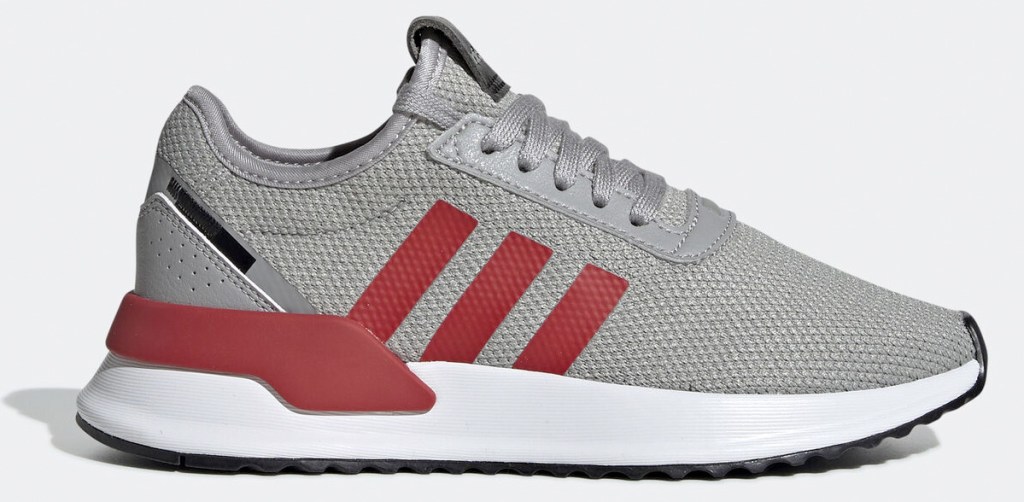 grey mesh running shoe with three red adidas stripes on side