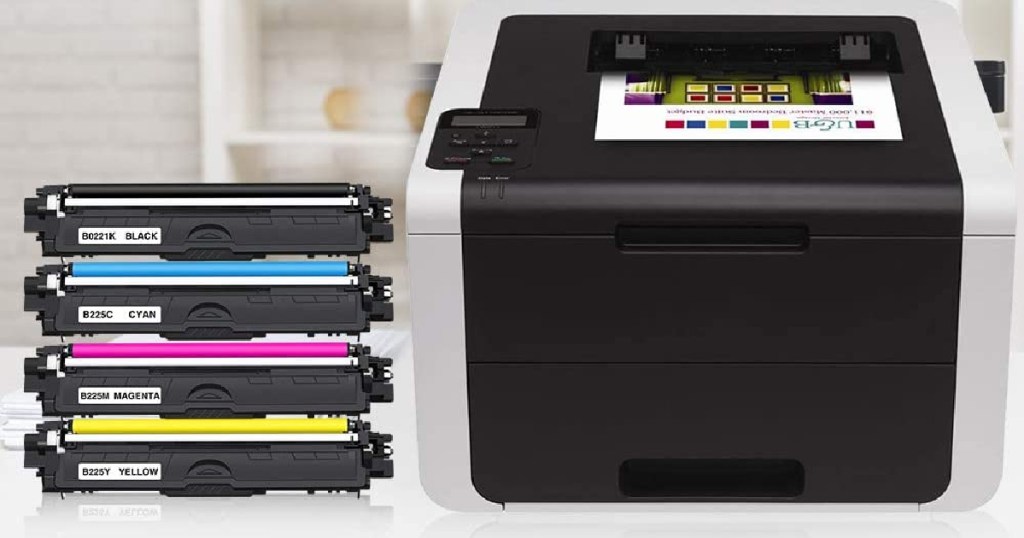 four ink cartridges sitting by printer