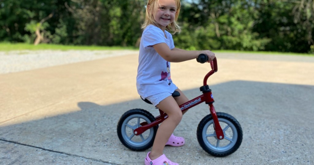 girl riding a Chicco Balance Bike