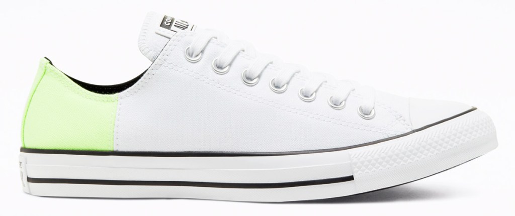 white canvas converse shoe with lime green heel and with white rubber toe