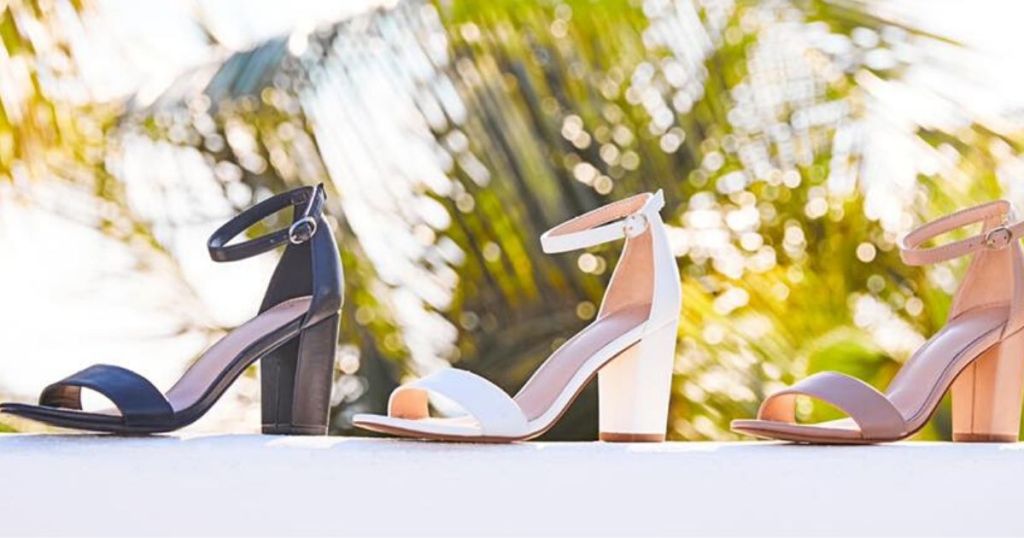 three womens dress sandals in front of palm trees