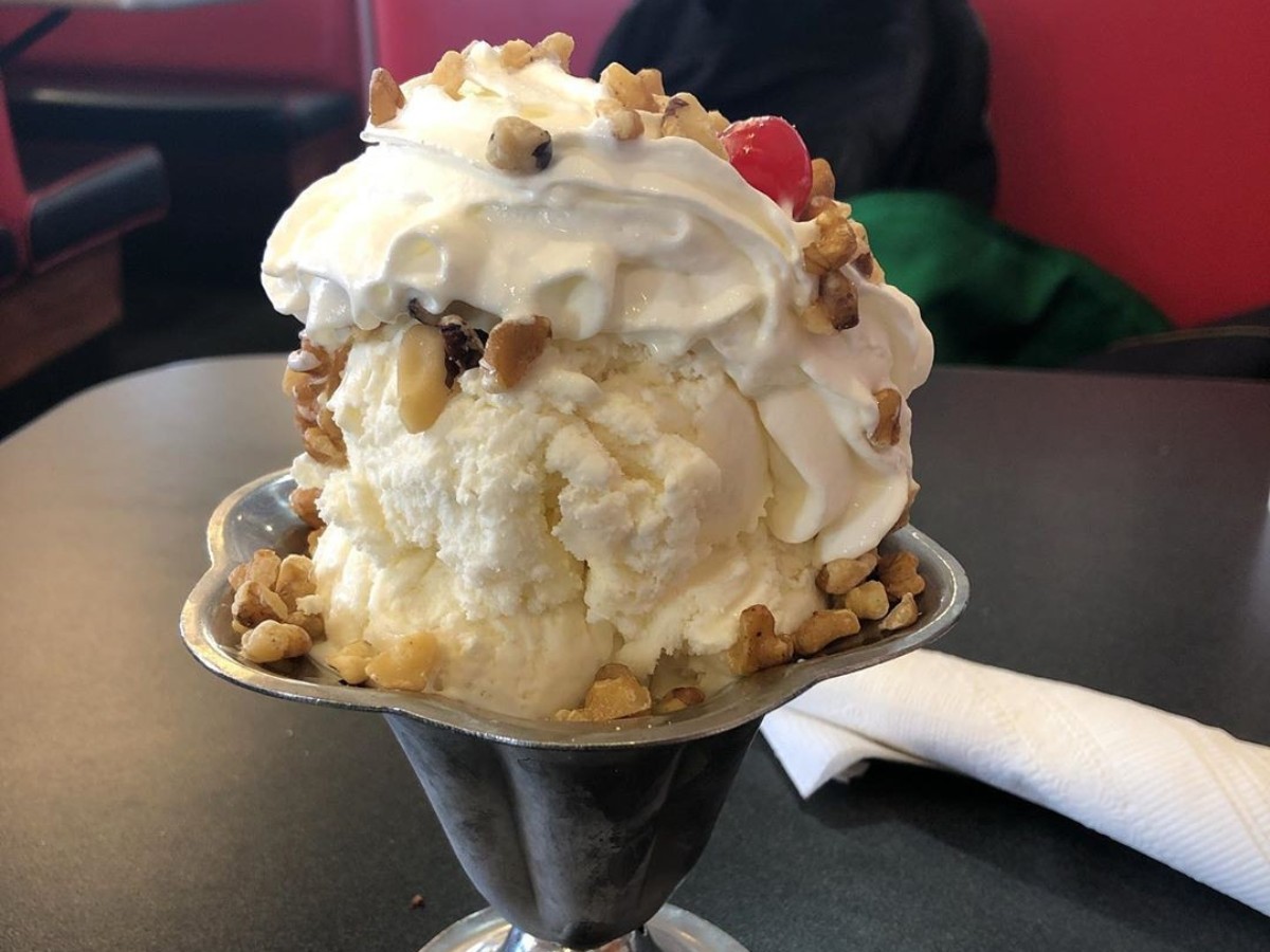 sundae with nuts in a silver bowl - birthday freebies