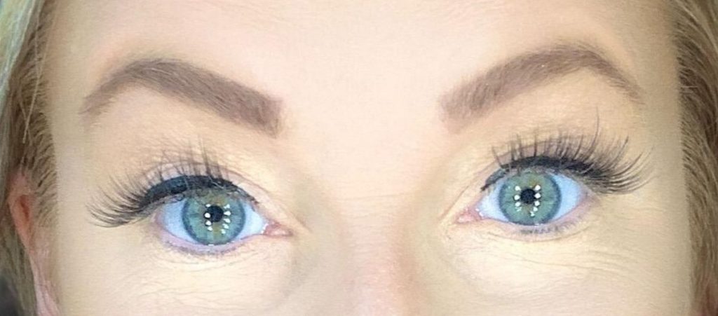 woman wearing fake eyelashes
