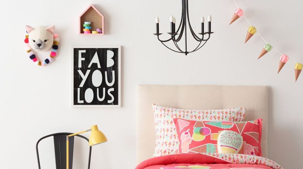 bedroom with bed and wall decor