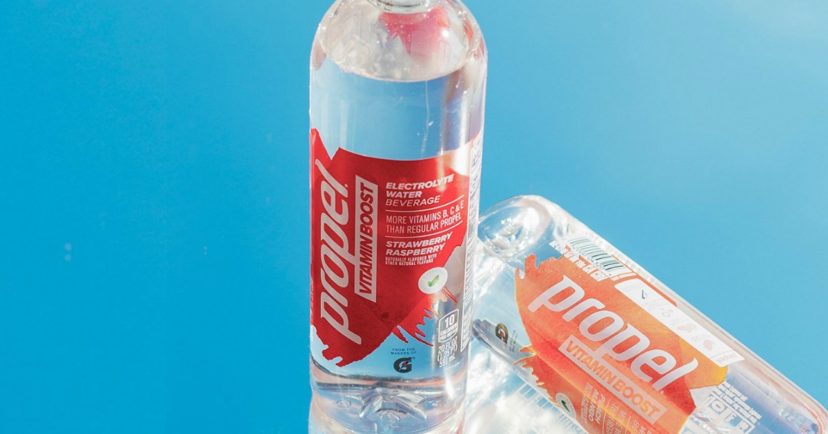 Propel vitamin water bottles on blue background